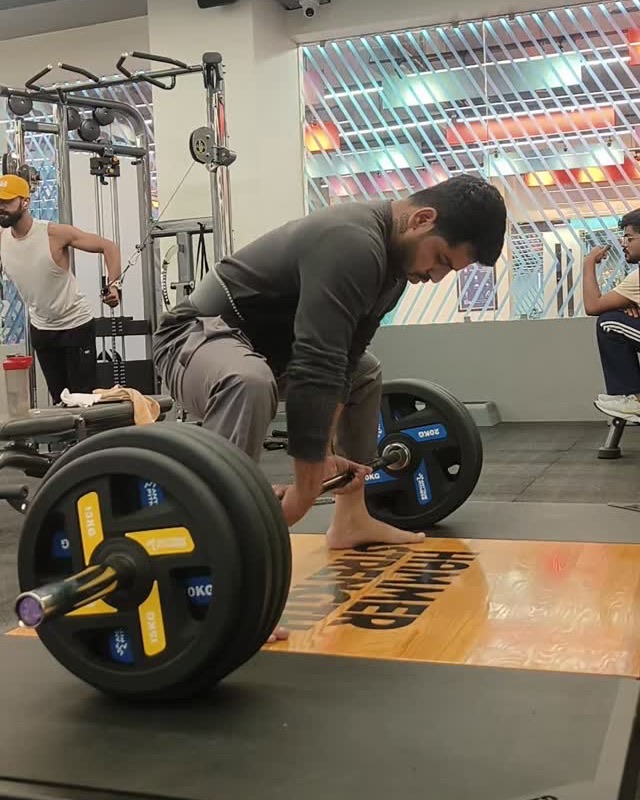 Reyansh pulling a heavy deadlift at the gym